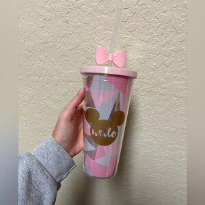 Used Disney pink plastic tumbler with bow. Some damage on item. 20 fl oz.